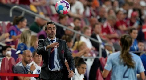 Spain soccer coach faces scrutiny for touching a female assistant on the chest while celebrating
